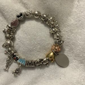 Pandora bangle w/23 charms 3 .925 unbranded and 20 .925 SS Pandora charms